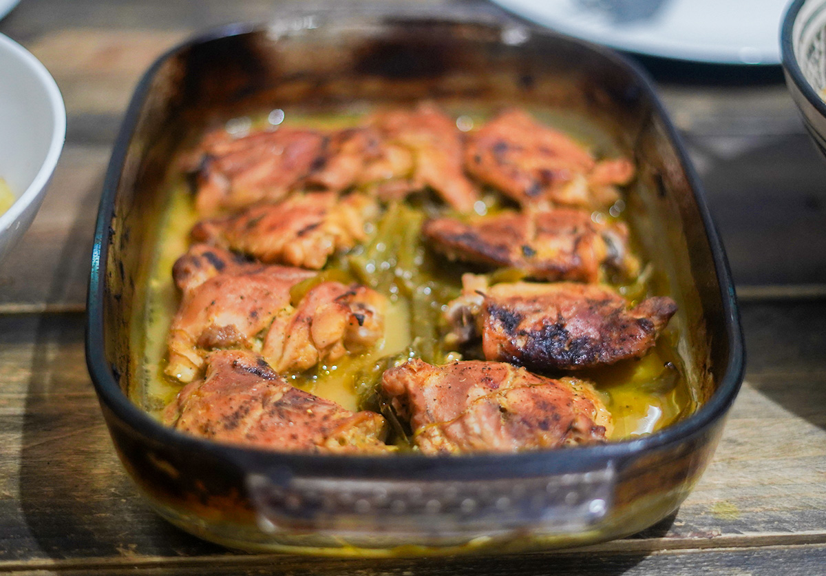 Moroccan chicken with orange sauce served at Nomad Surf Camp in Tamraght, Morocco